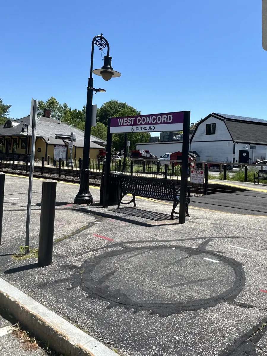 The West Concord commuter rail station platform and sign
